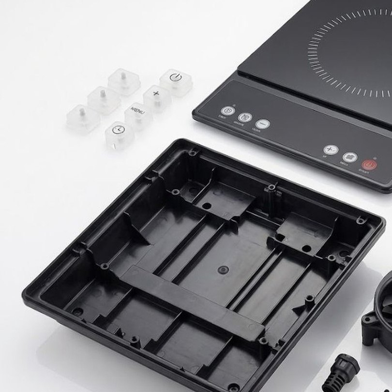 Induction cooktop moulded base, panel and knobs